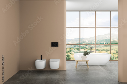 Modern bathroom interior with beige walls  ceramic basin with oval  mirror  bathtub and grey concrete floor. Minimalist beige bathroom with modern furniture. 3D rendering 