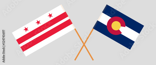 Crossed flags of The State of Colorado and the District of Columbia. Official colors. Correct proportion