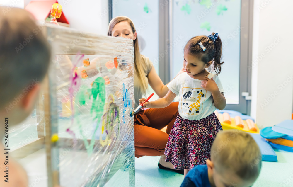 Cling film painting for improving kids imagination. Toddlers painting