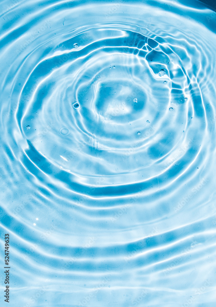 Flow of water is pouring on rippled water surface. Abstract background. Copy space for your design - stock photo Flow of water is pouring on rippled water surface. Abstract background. Copy space for your design - stock photo