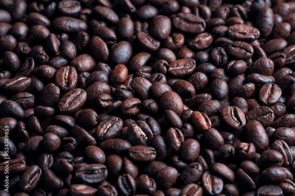 dark roasted coffee beans close up background dark roasted coffee beans close up background