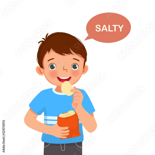 cute little boy holding potato chip showing salty taste of tongue five senses