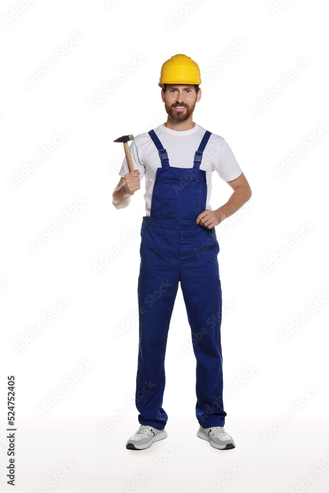 Professional builder in uniform with hammer isolated on white Professional builder in uniform with hammer isolated on white
