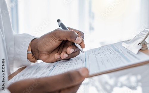 Doctor writing survey, insurance and claim form for medical paperwork, document and script for patient records, test result and research in a hospital. Physician hands signing and planning healthcare