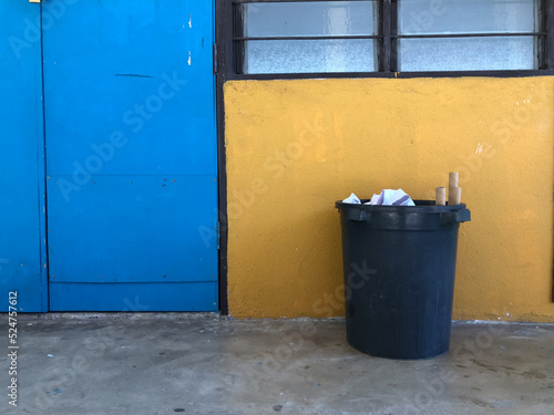 Garbage bin with trashes at the class corridor