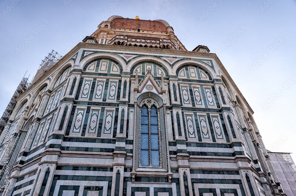 Florence, Italy - July 12, 2022: Architectural details of the Cathedral of Santa Maria del Fiore, Giotto's Tower and St. John's Bapistry in Florence Florence, Italy - July 12, 2022: Architectural details of the Cathedral of Santa Maria del Fiore, Giotto's Tower and St. John's Bapistry in Florence