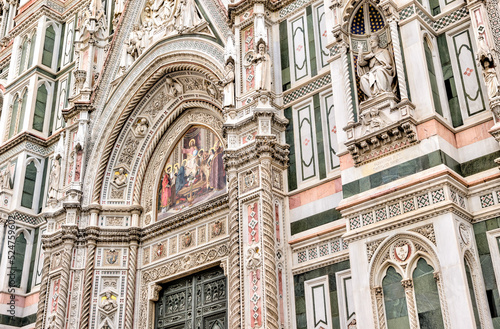 Florence, Italy - July 12, 2022: Architectural details of the Cathedral of Santa Maria del Fiore, Giotto's Tower and St. John's Bapistry in Florence