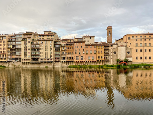 Views of the St Trinity Bridge and Ponte Vecchio along the Arno River in Florence Italy © Torval Mork