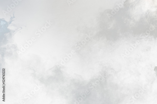 Dense Fluffy Puffs of White Smoke and Fog on transparent png Background, Abstract Smoke Clouds, Movement Blurred out of focus. Smoking blows from machine dry ice fly fluttering in Air, effect texture photo
