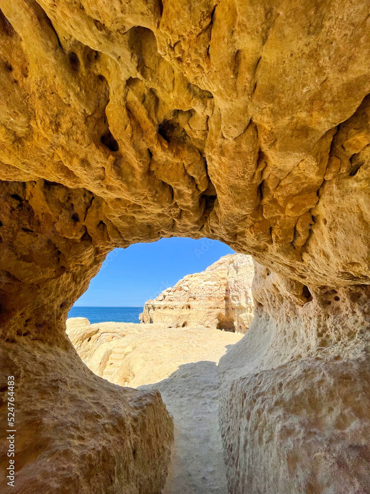 Rock and caves at Boneca beach Algarve Portugal. High quality photo