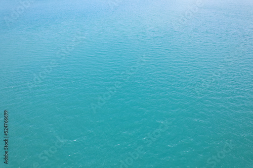 Sea surface aerial view,Bird eye view photo of blue waves and water surface texture Blue sea background Beautiful nature Amazing high angle view background