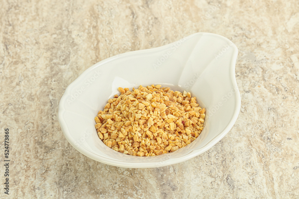Crunched roasted peanut in the bowl Crunched roasted peanut in the bowl