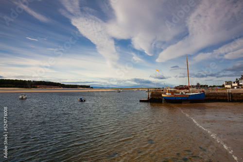Canvas-taulu Fishing boat in port in Findhorn,Scotland.