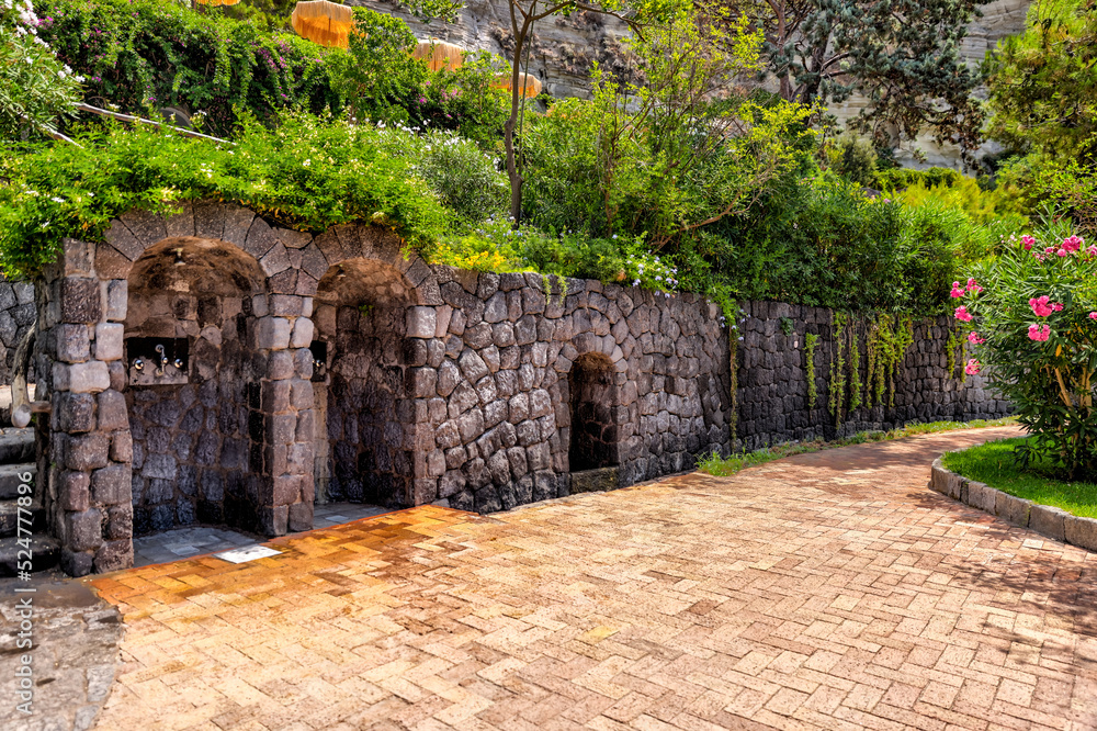 Rustic stairs and pathways amongst the colourful beach chairs and umbrellas in the hot springs on the island of Ischia in Italy
Rustic stairs and pathways amongst the colourful beach chairs and umbrellas in the hot springs on the island of Ischia in Italy