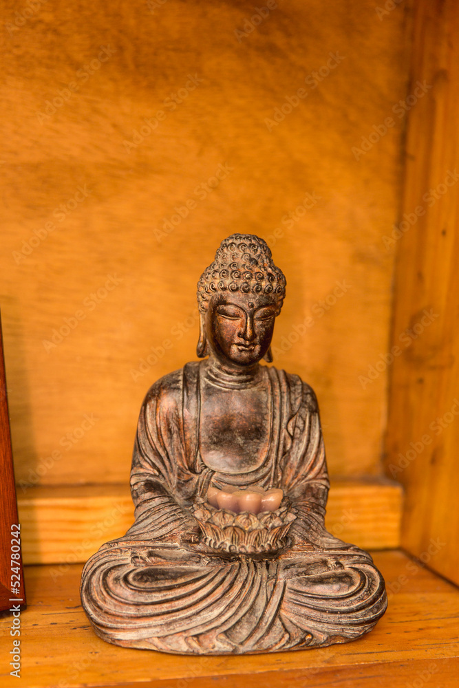 Budda statue on wood alter