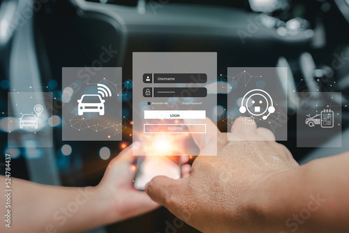 Car service and business on virtual screen concept, Hand a man use smartphone and log-in to the security system of the car, online find a car system with Real-time vehicle tracking technology
