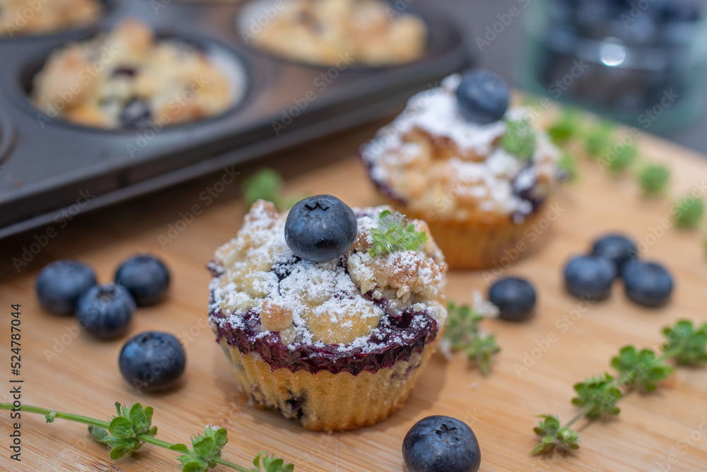 Freshly baked blueberry muffin on a table