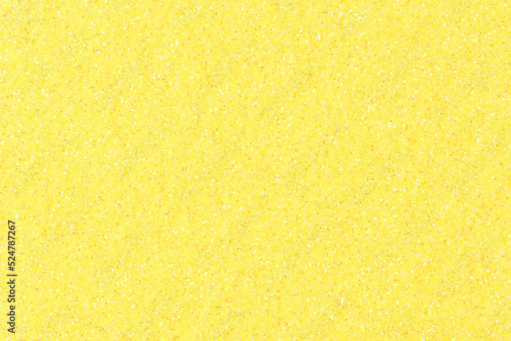 Glitter texture, background in beautiful yellow tone for holiday mood. Sparkling shiny wrapping paper for Christmas holiday seasonal wallpaper decoration, greeting and winter Christmas design element. Glitter texture, background in beautiful yellow tone for holiday mood. Sparkling shiny wrapping paper for Christmas holiday seasonal wallpaper decoration, greeting and winter Christmas design element.