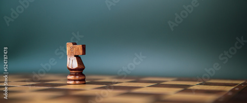 Foto Horse chess piece stand on chessboard concepts of competition challenge of leader business team or teamwork volunteer or wining and leadership strategic plan and risk management or team player