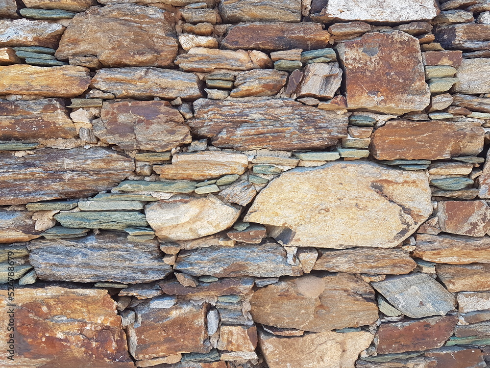 wall of rocks in andros island greece wall of rocks in andros island greece