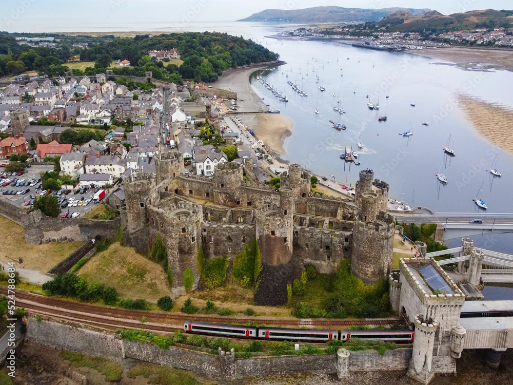 Aerial view of Conwy Castle in the town of Conwy in North Wales. It was built by Edward I, during his conquest of Wales, between 1283 and 1287. UNESCO World Heritage Site.