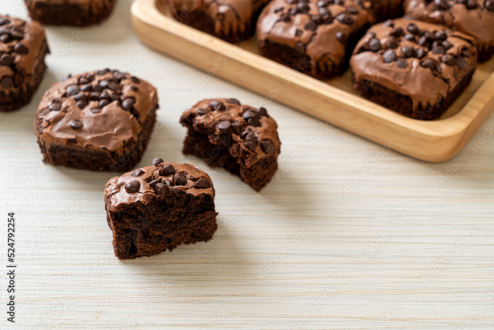 dark chocolate brownies topped by chocolate chips dark chocolate brownies topped by chocolate chips