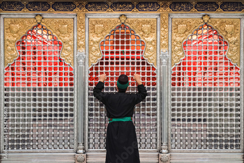 The sacred month of Muharram Ashura in Karbala, Iraq, the shrine of Imam Hussein and Abbas, sons of Imam Ali, peace be upon them photo