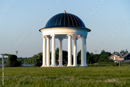 Rotunda in the park at sunset time photo