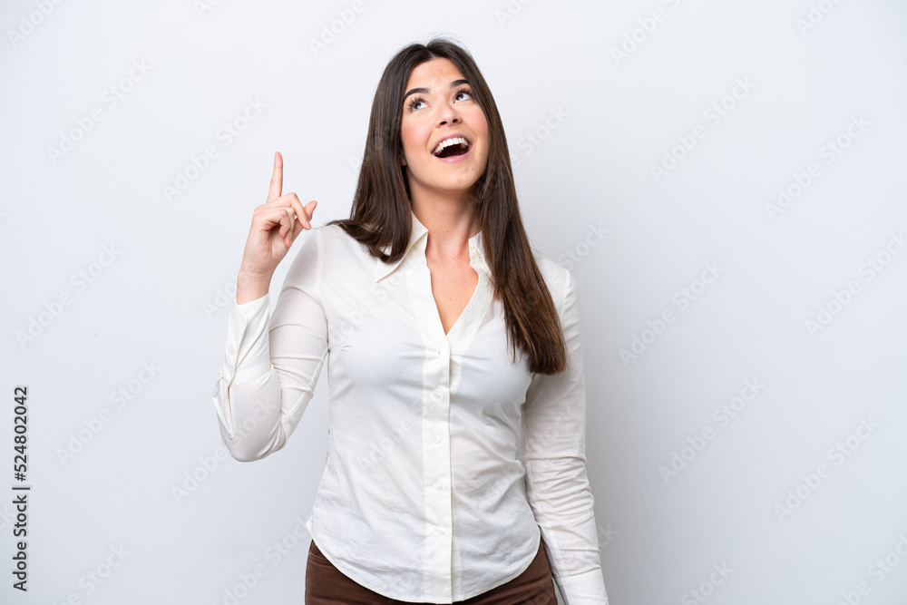 Young Brazilian woman isolated on white background pointing up and surprised Young Brazilian woman isolated on white background pointing up and surprised