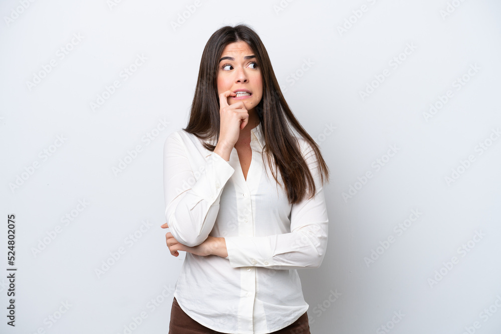 Young Brazilian woman isolated on white background nervous and scared Young Brazilian woman isolated on white background nervous and scared