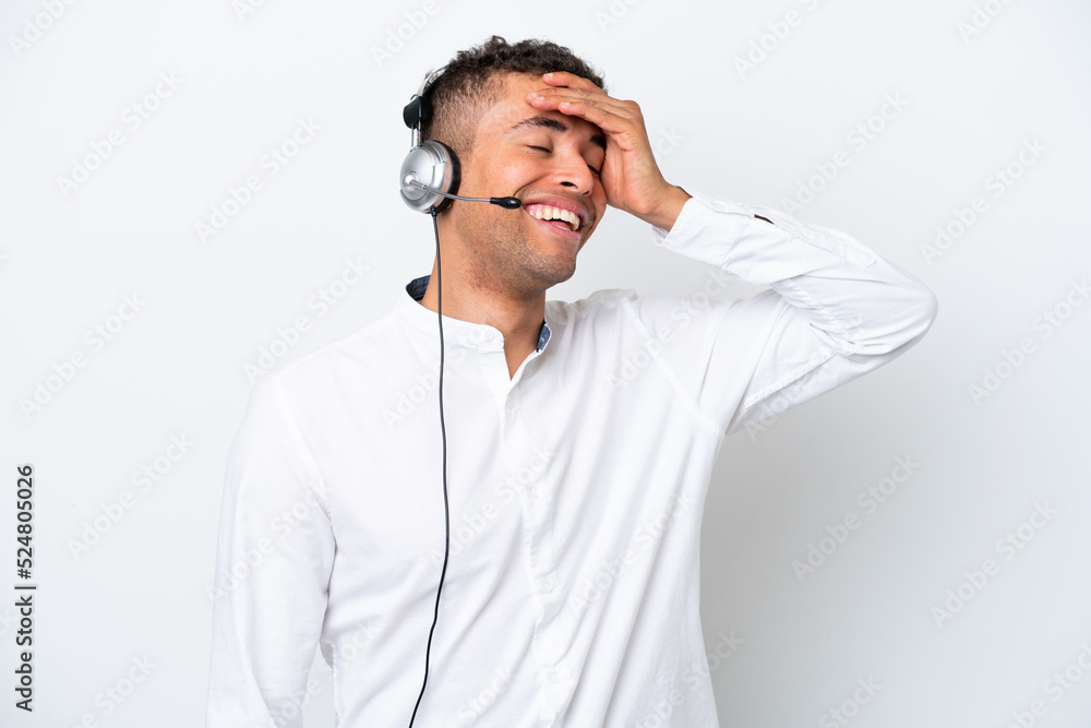 Telemarketer Brazilian man working with a headset isolated on white background has realized something and intending the solution Telemarketer Brazilian man working with a headset isolated on white background has realized something and intending the solution