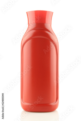 Blank red plastic ketchup packaging isolated on white background