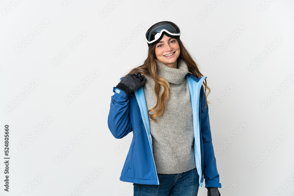 Skier girl with snowboarding glasses isolated on white background laughing Skier girl with snowboarding glasses isolated on white background laughing
