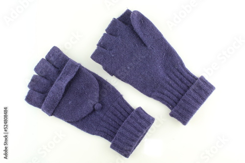 Violet woolen winter gloves isolated on white background
