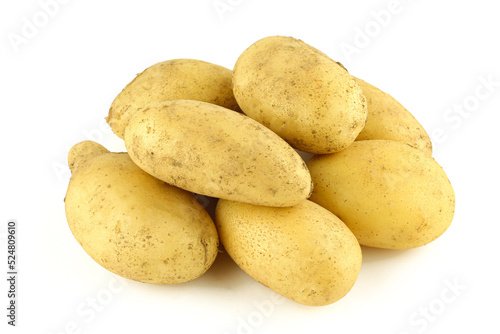 Group of regular organic potatoes isolated on white background