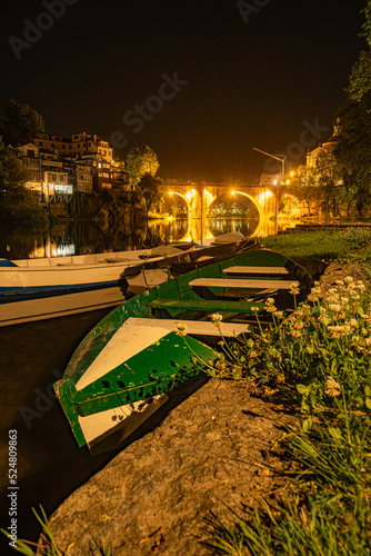 View at the Sao Goncalo monastery and the Old bridge over the river Tamega in Amarante at night - Portugal photo