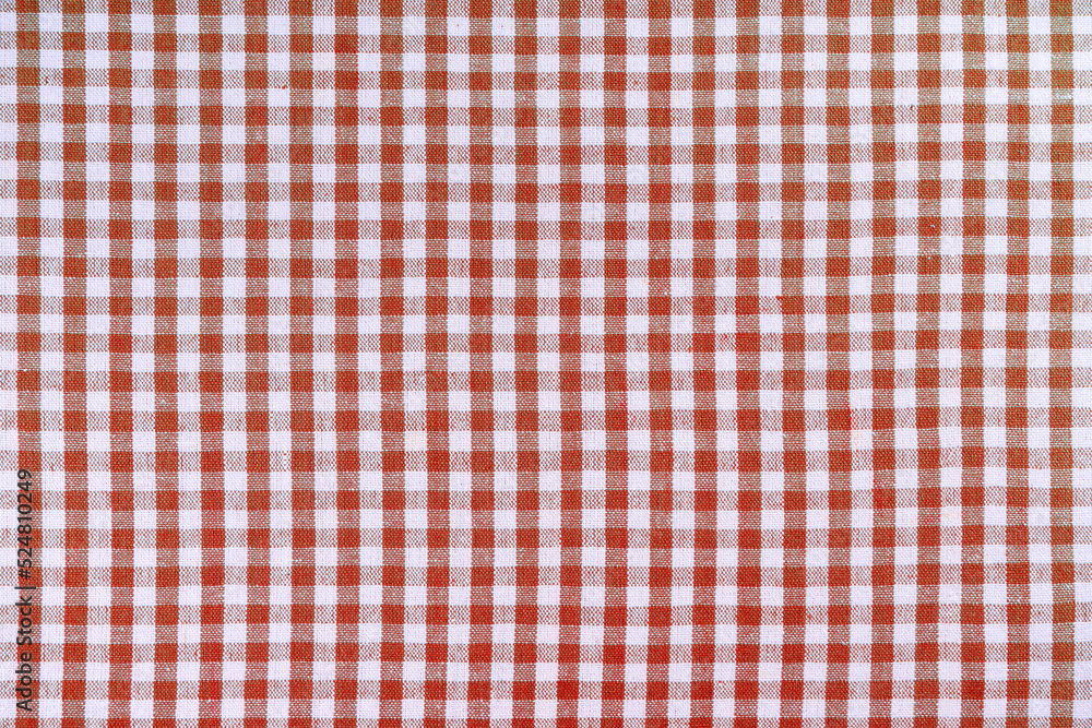 Red classic checkered tablecloth texture, background with copy space. Background texture checkered pattern fabric for cuisine, menu. Food mockup, template, restaurant wallpaper, kitchen backdrop