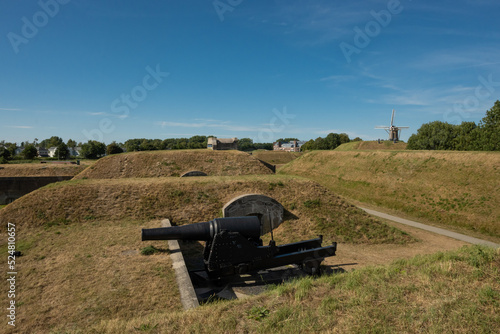 A cannon looking out to sea at the abandoned military fort in Hellevoetsluis in the Netherlands, originally constructed by the Dutch military but overtaken by the Nazis in world war 2 