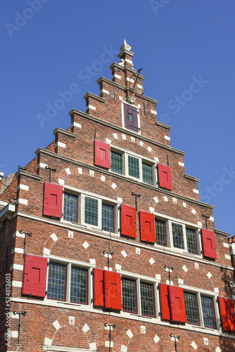 Amsterdam, Netherlands. August 2022. A historic canal house on the Oudezijds Voorburgwal in Amsterdam.