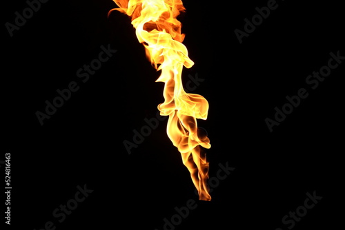 Yellow fire flames isolated on a black background