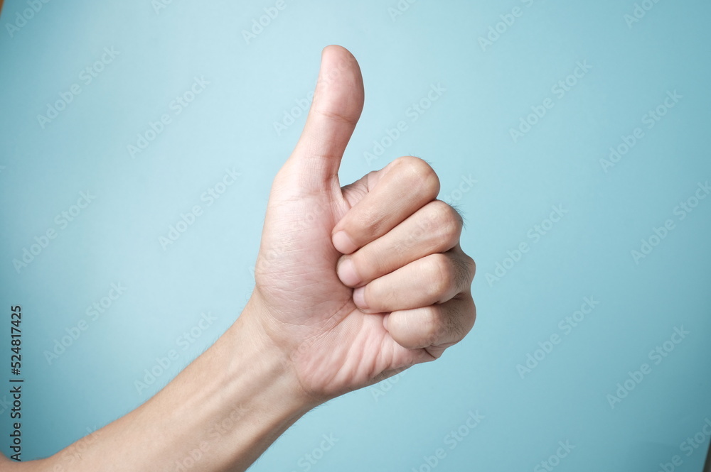hand showing thumbs up