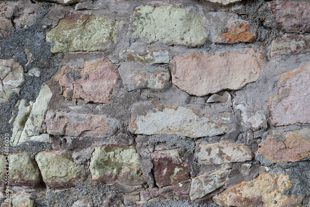 Background from an ancient stone wall. Old wall with stone pattern Background from an ancient stone wall. Old wall with stone pattern