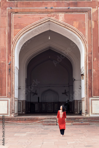 Female traveler outside old Grand Mosque photo