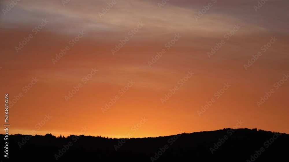 sunrise timelapse with mountains and red sky, illuminated clouds sunrise timelapse with mountains and red sky, illuminated clouds