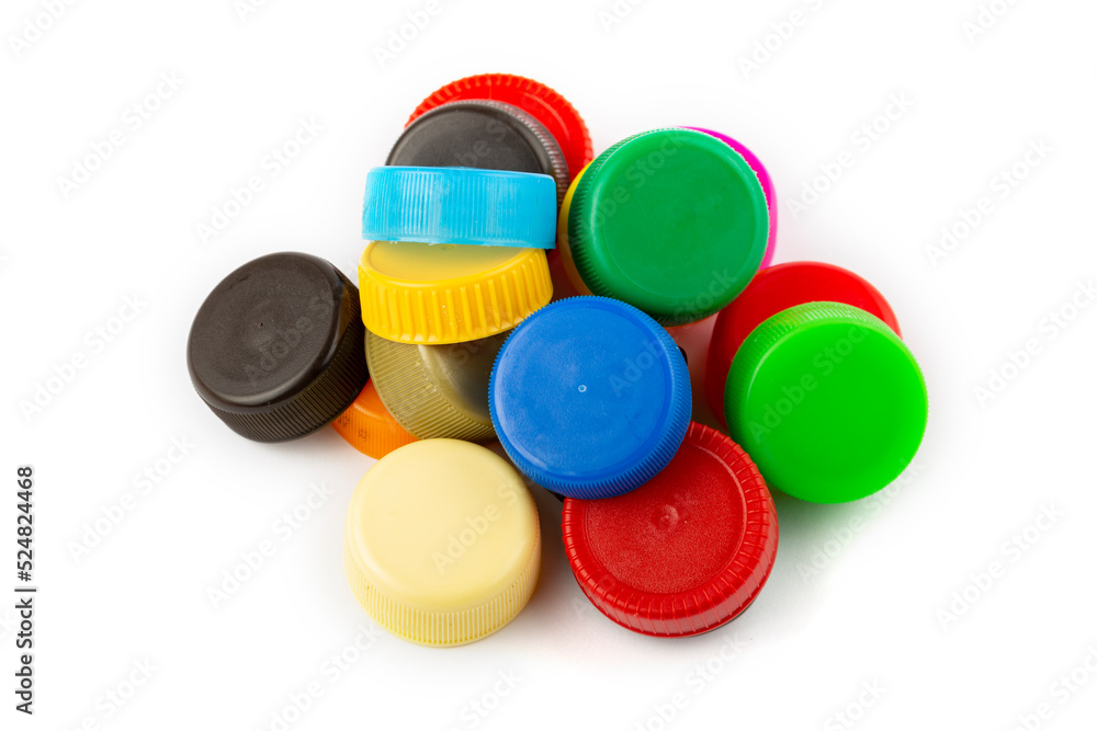 Сolorful plastic caps on white background, recycle for environment concept. Separate wa Сolorful plastic caps on white background, recycle for environment concept. Separate wa