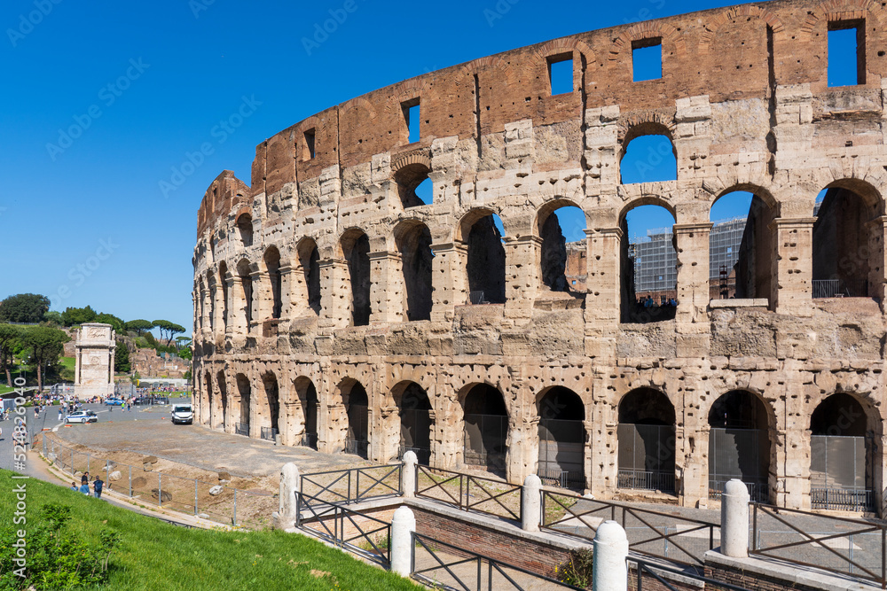 Photo of the south side of the Colosseum (Via Celio Vibenna) in Rome