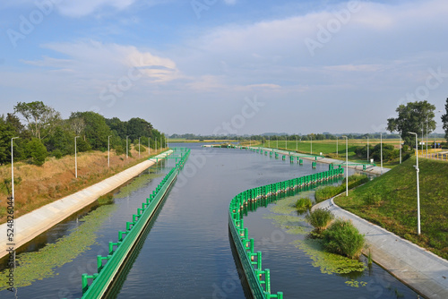 The canal of the historic sluice in Przegalina for ships sailing at different water levels between the Vistula and the Martwa Wisla. Poland