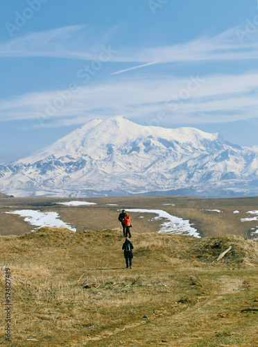 Panoramic view of the high mount Elbrus
observers for a snow-covered high mountain in a haze