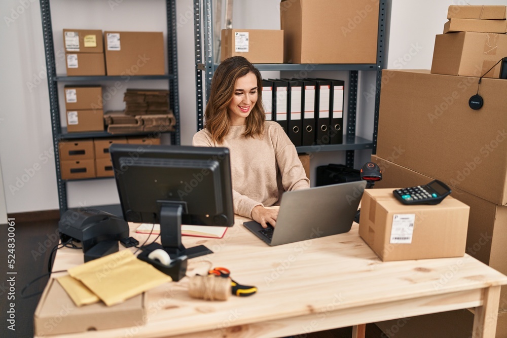Young woman ecommerce business worker working at office Young woman ecommerce business worker working at office
