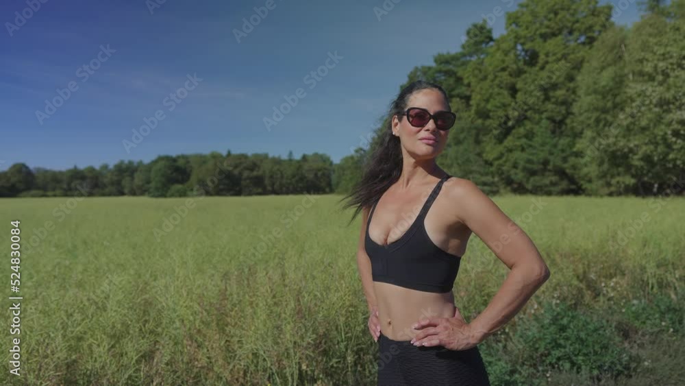 Woman realxing in the sunlight during hot summer afternoon Woman realxing in the sunlight during hot summer afternoon